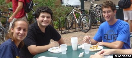 Jewish students at the University of Virginia enjoy the first Café Chabad event organized by the local Chabad House.