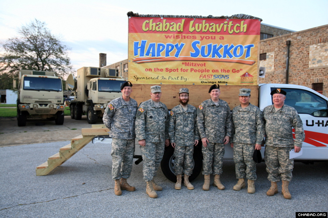 Soldiers with the Maryland Defense Force visited a mobile sukkah last week at the Pikesville Military Reservation.