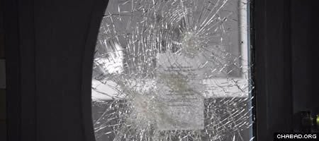 An explosion damaged glass at the entryway to the Jewish community center in Malmo, Sweden. (Photo: Patrick Persson/Sydsvenskan)