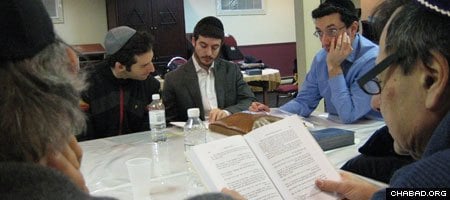 Studying the Tanya, the foundational work of Chabad philosophy, at Chabad of Queen Mary, Montreal, Canada.