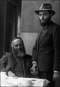 Her father, the sixth Chabad rebbe, Rabbi Yosef Yitzchak Schneersohn (sitting), with her future husband, Rabbi Menachem Mendel Schneerson