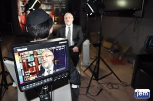 Rabbi Michoel Hazan being interviewed in JEM's studio