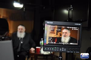 Rabbi Nissen Mangel being interviewed by JEM