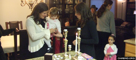 Shabbat meals preceded by candle lighting for women and girls are the highlight of every week.