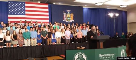 Rabbi Aaron Slonim delivering the invocation at the presidential town hall meeting at Binghamton University. (Photo: Chabad of Binghamton)