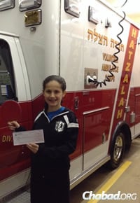 Winners of the Kids Got Talent contest also got a check for their favorite charity. Estee gave a donation to Hatzalah Volunteer Ambulance Corps. of Nassau County, N.Y.