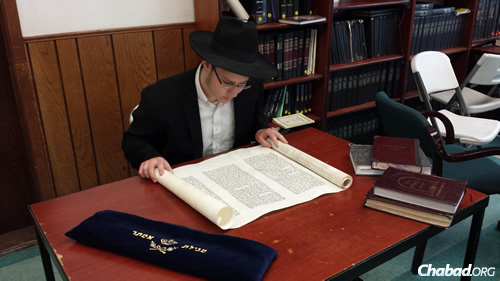 Dovid Weingrow, 14, is ready to read the Megillah for others this Purim. He estimates that it took him six months to learn how to master it.