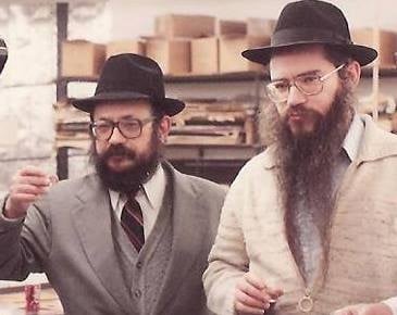 Rabbi Feller and Rabbi Friedman say "Lechaim!"