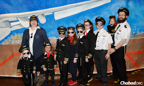The Geisinskys of Chabad of the Five Towns get ready to take off on a Purim adventure.