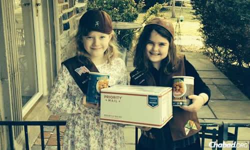 Brownie Juliettes Hannah Rose Brophy and Freida Rochel Atkins started a project this Passover to send cans of macaroons to Jewish soldiers overseas.