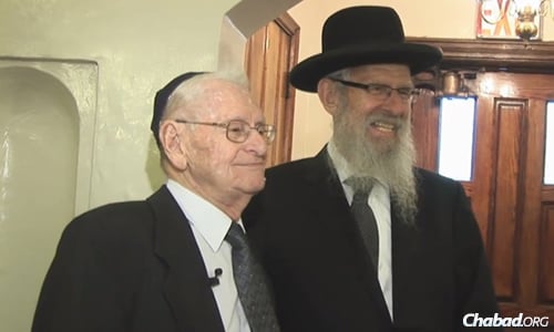 Rabbi Mordechai (Mottel) Fisher, left, with his schoolmate and friend, Rabbi Abraham Hecht, in 2010. (Photo: JEM)