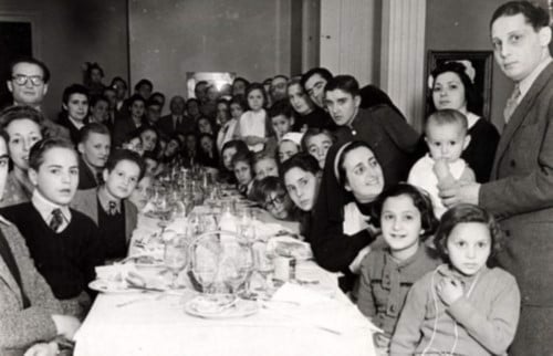 A group of children and adults prepare to set sail in 1943. To the right is Samuel Sequerra, a Portuguese Jew who helped Jewish refugees in both Spain and Portugal.