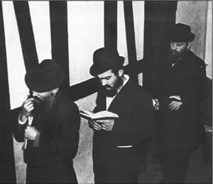 Chassidim waiting outside the Rebbe&#39;s study for yechidut, circa 1970