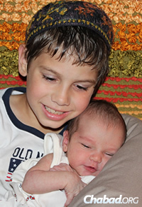 The baby and his 7-year-old brother, Ehud Daniel