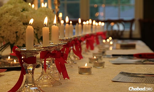 Rows of candles were set up last week at the home of Rabbi Zalman and Toba Grossbaum, co-directors of Chabad of Livingston, N.J., so community members and family could welcome in Shabbat and pray for the people of Israel.