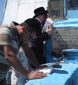 Praying at the Arizal&#39;s resting place in Safed (Credit: Louski1)