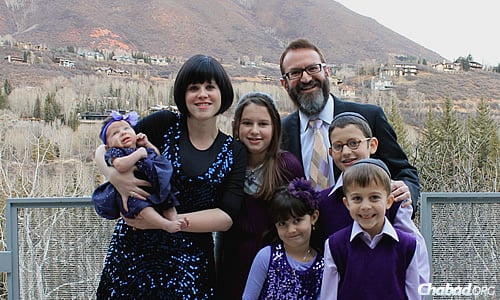 Rabbi Mendel and Leiba Mintz and their children in a photo taken about a year-and-a-half ago. In July, the family welcomed a new baby girl.