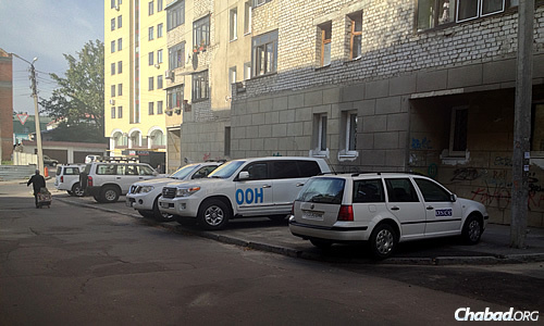 A large group of Organization for Security and Cooperation in Europe (OSCE) officials—their identifiable trucks parked in town—was observed recently in Kharkov.