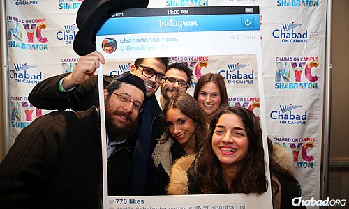 A moment of levity, with a souvenir photo to help make the memories last until next year. (Photo: Bentzi Sasson/Chabad.edu)
