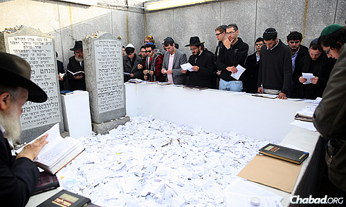 At the Ohel in Queens, N.Y., the resting place of the Rebbe—Rabbi Menachem M. Schneerson, of righteous memory—where visitors can write and leave letters and notes. (Photo: Bentzi Sasson/Chabad.edu)