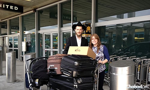 The Kesselmans at New York’s LaGuardia Airport, ready to leave for a new home in Texas.