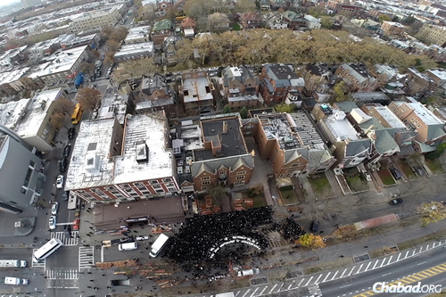 A drone’s-eye view of the gathering for the group portrait in the Crown Heights neighborhood of Brooklyn, N.Y. s (Photo: CJ Studios)