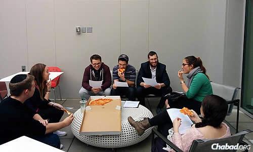A &quot;Pizza and Parsha&quot; class at American University in Washington, D.C., co-directed by Chabad Lubavitch of the AU Community Rabbi Yehoshua and Esti Hecht.