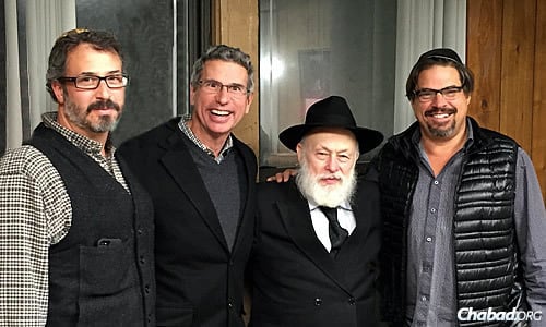 At the recent International Conference of Chabad emissaries in New York: from left, Montana residents Stu Binenstock, Dr. Mick Lifson and Larry Pearson, with Rabbi Yehuda Krinsky, chairman of Merkos L&#39;Inyonei Chinuch, the educational arm of the Chabad-Lubavitch movement. Lifson studied a chapter a day of Mishneh Torah, completing the cycle in three years.