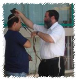 Donning Tefillin with a resident of the Nothern Israeli town Akko