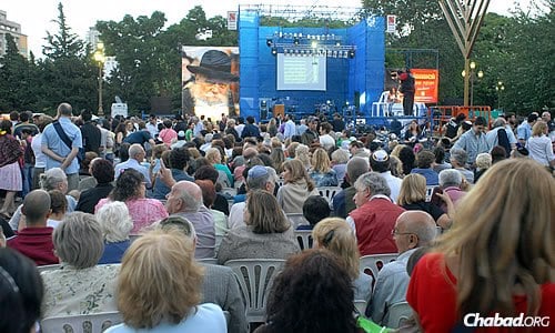 A more contemporary crowd gathers for the lighting, which takes place in the summertime in Argentina.