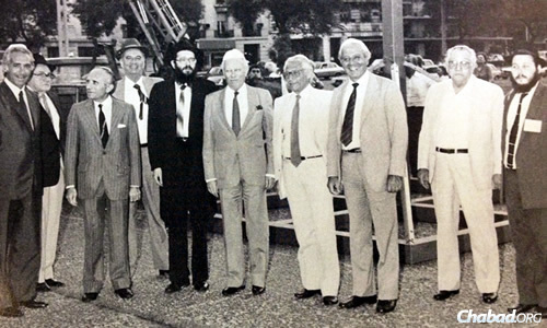 Rabbi Tzvi Grunblatt, fifth from left, with communal leaders at Chanukah 1984-1985, a year after the director of Chabad Lubavitch of Argentina erected a public menorah in Buenos Aires to a concerned Jewish community.