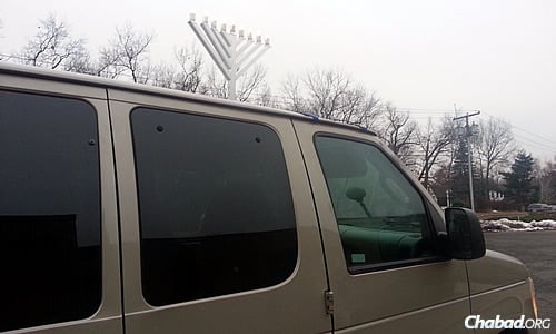 This car menorah was what Yoni Walz saw when he was lost in suburban Connecticut; in fact, it led him to a place to stay for Shabbat during Chanukah.