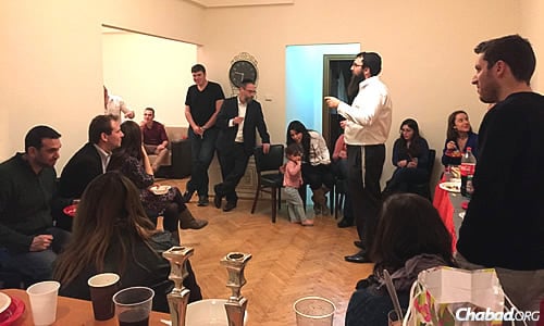 Rabbi Orgad hosts a birthday party for one of the students, typical of the intimate kinds of get-togethers they are fostering at first.