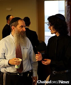 Dylan Thomas, a finalist in the Sinai Scholars Symposium, with Rabbi Menachem Schmidt, president of Chabad on Campus International. A senior at UC Berkeley, Thomas presented a research paper on the demographic challenges facing Israel. (Photo: Bentzi Sasson)