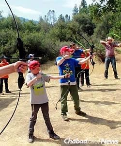 Archery is popular, with the correct techniques being taught.