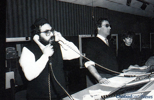 Rabbi Hillel Dovid Krinsky, JEM&#39;s founder, working the phones during a broadcast. (JEM Photo)