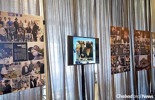 A specially curated gallery of photos of the Rebbe and Chabad’s activities all over the world line the halls of the Knesset building. (Photo: Meir Alfasi)