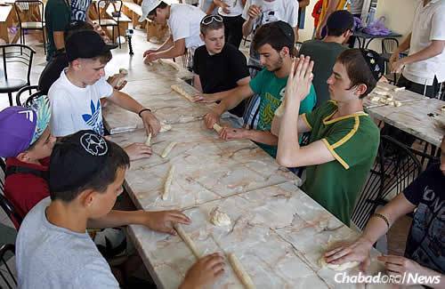 Activities at Camp Yeka include swimming, sports and Jewish classes—and making challah, too, even for the older boys.