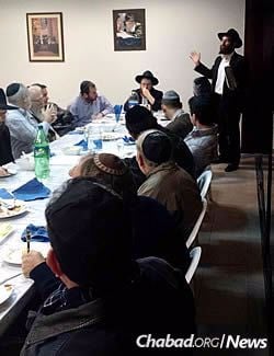 Rabbi Yecheskel Posner shares a Torah thought at Chabad in Lima, Peru.