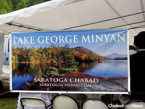 Chabad Lubavitch of Saratoga Springs in Upstate New York, co-directeed by Rabbi Abba and Raizel Rubin, holds the popular “Lake George Minyan” in a large tent during the summer. (Photo: JDN)