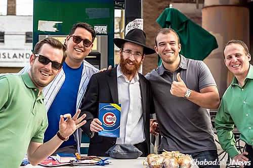Rabbi Dovid Kotlarsky, co-director of Chabad of East Lakeview on Chicago’s North Side, has set up a tefillin booth outside of Chicago&#39;s Wrigley Field that encourages baseball fans to do a mitzvah.