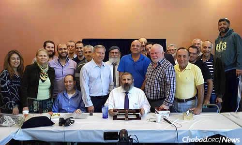 Rabbi Yehoshua B. Gordon's California study group two years ago, when the class completed the three-year track of Mishneh Torah. His teaching continues to draw tens of thousands of online students to classes on Jewish.tv.