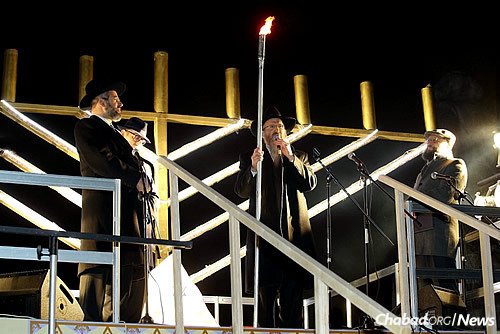 The lighting of the first candle on the Chanukah menorah in Revolution Square in Moscow.
