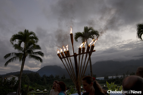 The tiki-torch menorah at Chabad of Kauai was the final public menorah-lighting of the year.