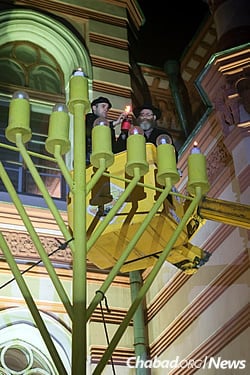 Rabbi Mendel Pewzner, chief rabbi of St. Petersburg since 1992, lights the giant menorah standing outside the city&#39;s Grand Choral Synagogue, barely a ten minute drive from the fortress where Rabbi Schneur Zalman of Liadi was imprisoned in 1798.