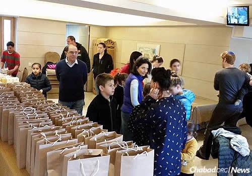 Jewish community members of all ages helped prepare the packages.