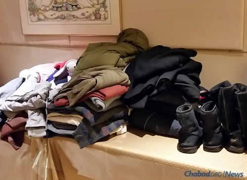 Warm-weather gear and blankets were first donated to and collected by Chabad when temperatures plummeted last week, leaving people in the streets struggling with the cold. Later, funds were raised to buy coats and shoes for those in need.