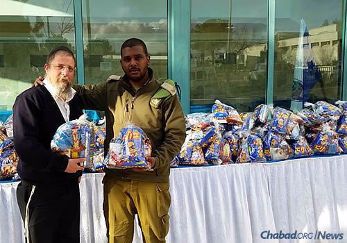 Bags of snacks to be distributed to Israeli soldiers, organized by Chabad of Kiryat Arba.