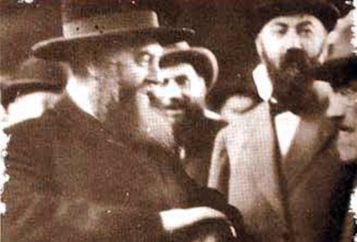 Rabbi Mordechai Dubin (right) was instrumental in rescuing the sixth Lubavitcher Rebbe (left) from the USSR.