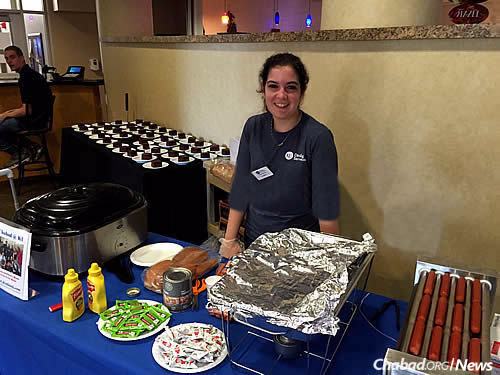 Stasi is all set up to serve at another campus venue: a monthly kosher dinner at Naismith Hall, a private student dormitory at K.U.